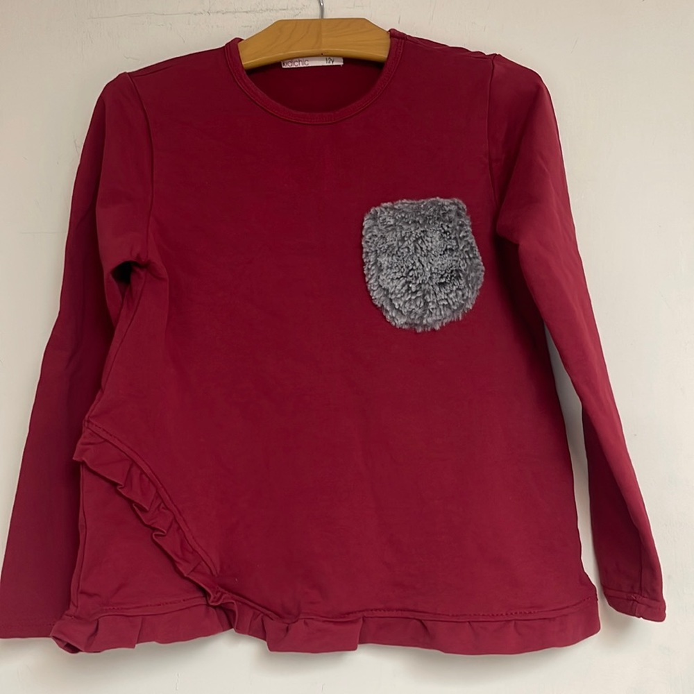 NWOT KIDICHIC top for girls size 12
Skirt is not included